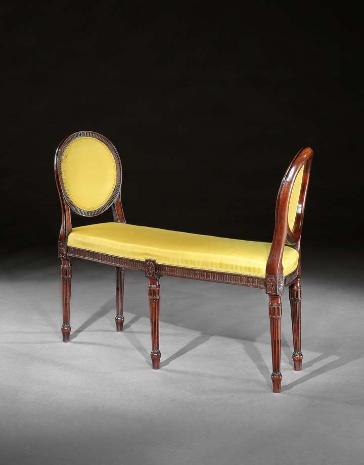 A PAIR OF GEORGE III MAHOGANY WINDOW SEATS